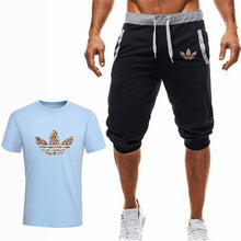 Laden Sie das Bild in den Galerie-Viewer, Summer Hot Sale Men&#39;s Sets T Shirts+Cropped Trousers Two Pieces Sets Casual Tracksuit New Male Casual Tshirt Gyms Fitness  Men