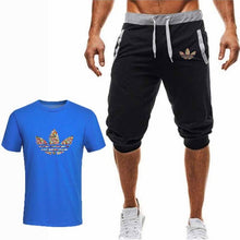 Laden Sie das Bild in den Galerie-Viewer, Summer Hot Sale Men&#39;s Sets T Shirts+Cropped Trousers Two Pieces Sets Casual Tracksuit New Male Casual Tshirt Gyms Fitness  Men